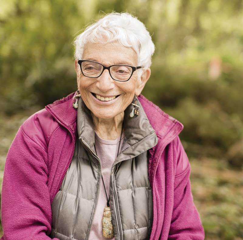 Senior Woman with glasses smiling