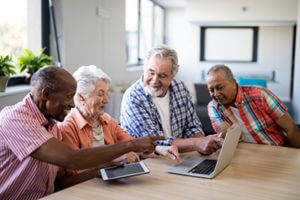 Seniors discuss assisted living at Discovery Village.