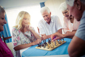 Group of People Playing Chess