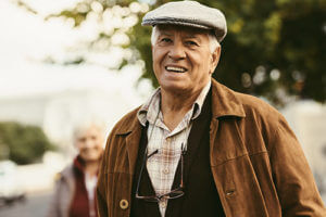 Man smiling because of senior living options at Discovery Village.