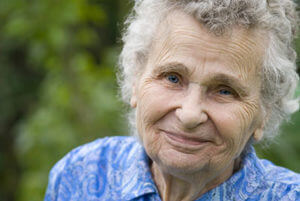 Woman enjoys exclusive senior living programs at Discovery Village.