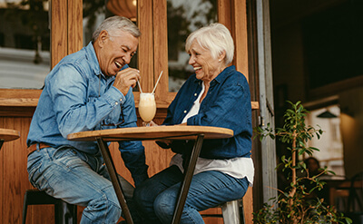 two seniors at a cafe during richmond virginia Senior Living Activities