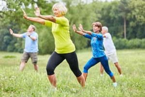 Discovery Village residents doing yoga