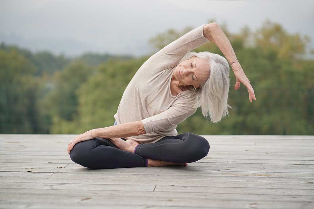 How Yoga Boosts Seniors' Mental Health - Discovery Village